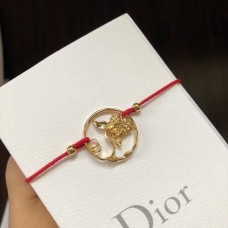 Herbstliches Christian Dior Diorelita Gelbgold-Hortensienmuster-Armband aus roter Baumwollkordel