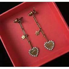 Dior LAmour Avenir lange Tropfenohrringe aus Messing mit weißem Kristall-Herz-Anhänger und Biene in Kanada